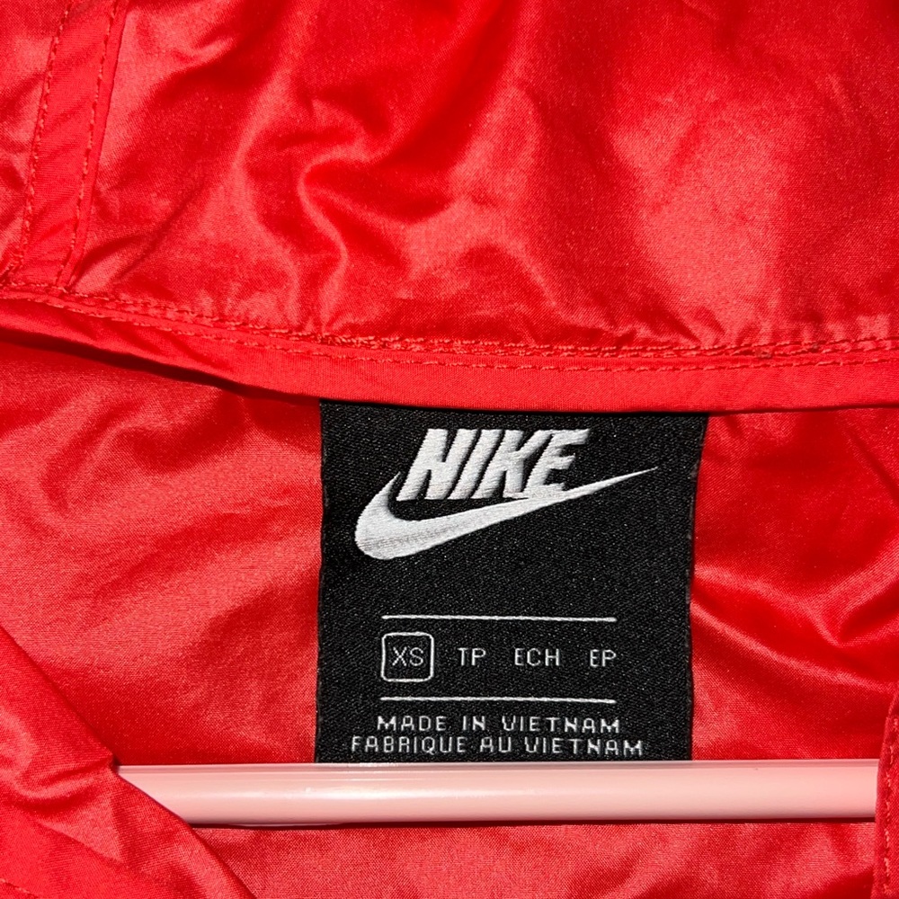 red and burgundy nike crop windbreaker